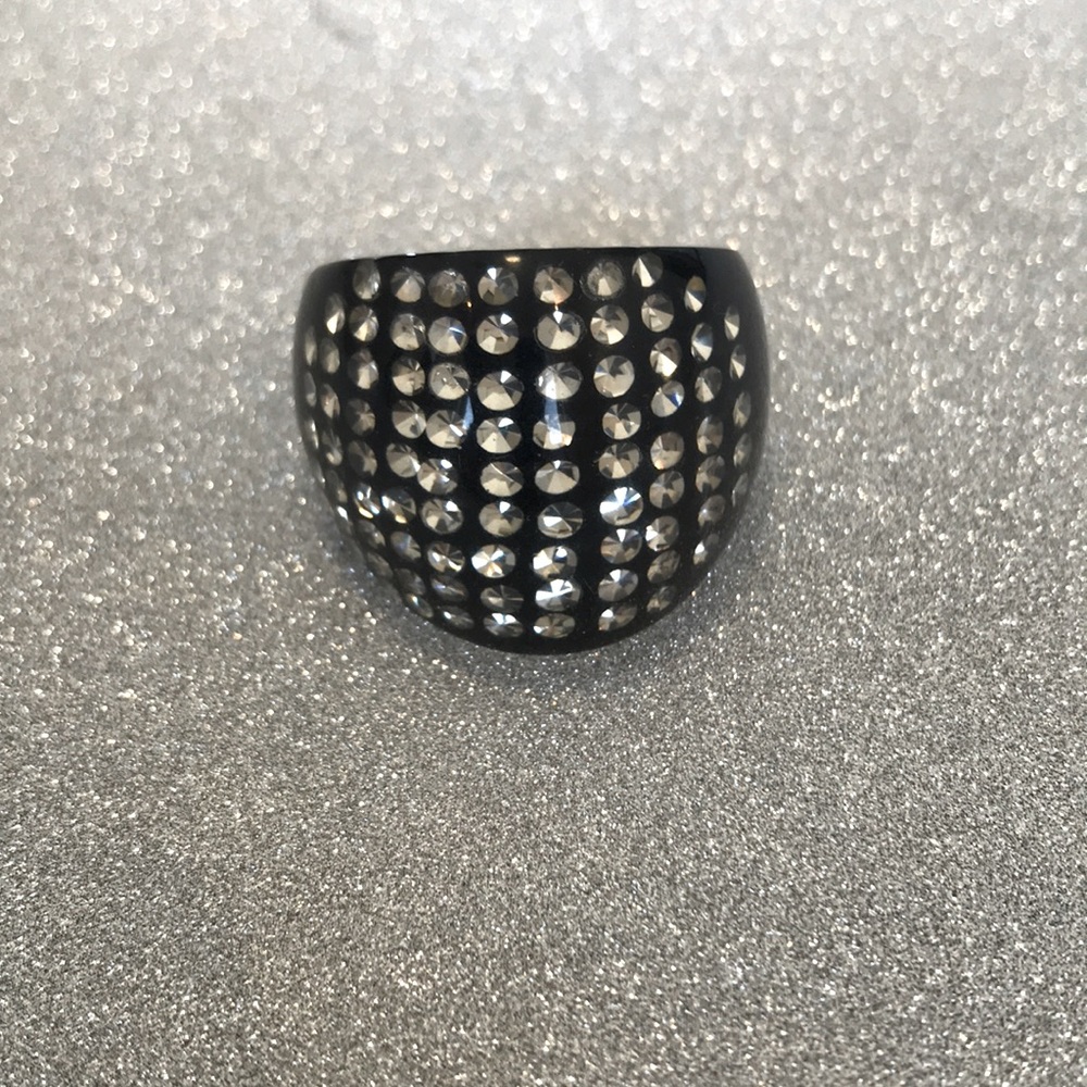 Aldo crystal ring with black base.